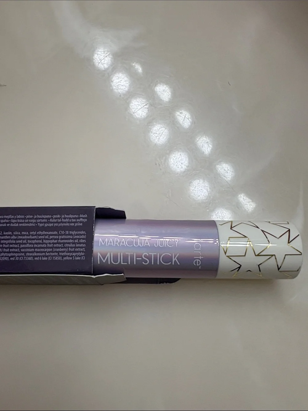 tarte Maracuja Juicy Multi-Stick in Deep Purple Tone